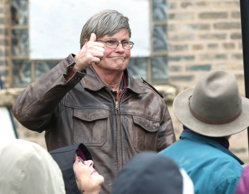 Roger Keys, owner of RW Keys & Son, who did the renovation on the Soldiers' and Sailors' Memorial Clock gives a thumbs up after being recognized Thursday, Nov. 11, 2021, during a Veterans Day and clock rededication ceremony at Memorial Park in downtown DeKalb.