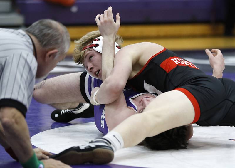Huntley's Radic Dvorak pins Hampshire's Mike Brannigan during the 157-pound match of a Fox Valley Conference wrestling meet on Wednesday, Jan. 8, 2025, at Hampshire High School.