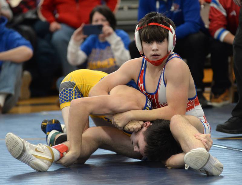 Oregon's Boone Alderks looks to the scorer's table as he wrestles Aurora Central Catholic's Vince Hefke in the championship match at 120 pounds at the Polo Wrestling Invitational on Saturday, Jan. 11, 2025 at Polo High School. Alderks won the match.