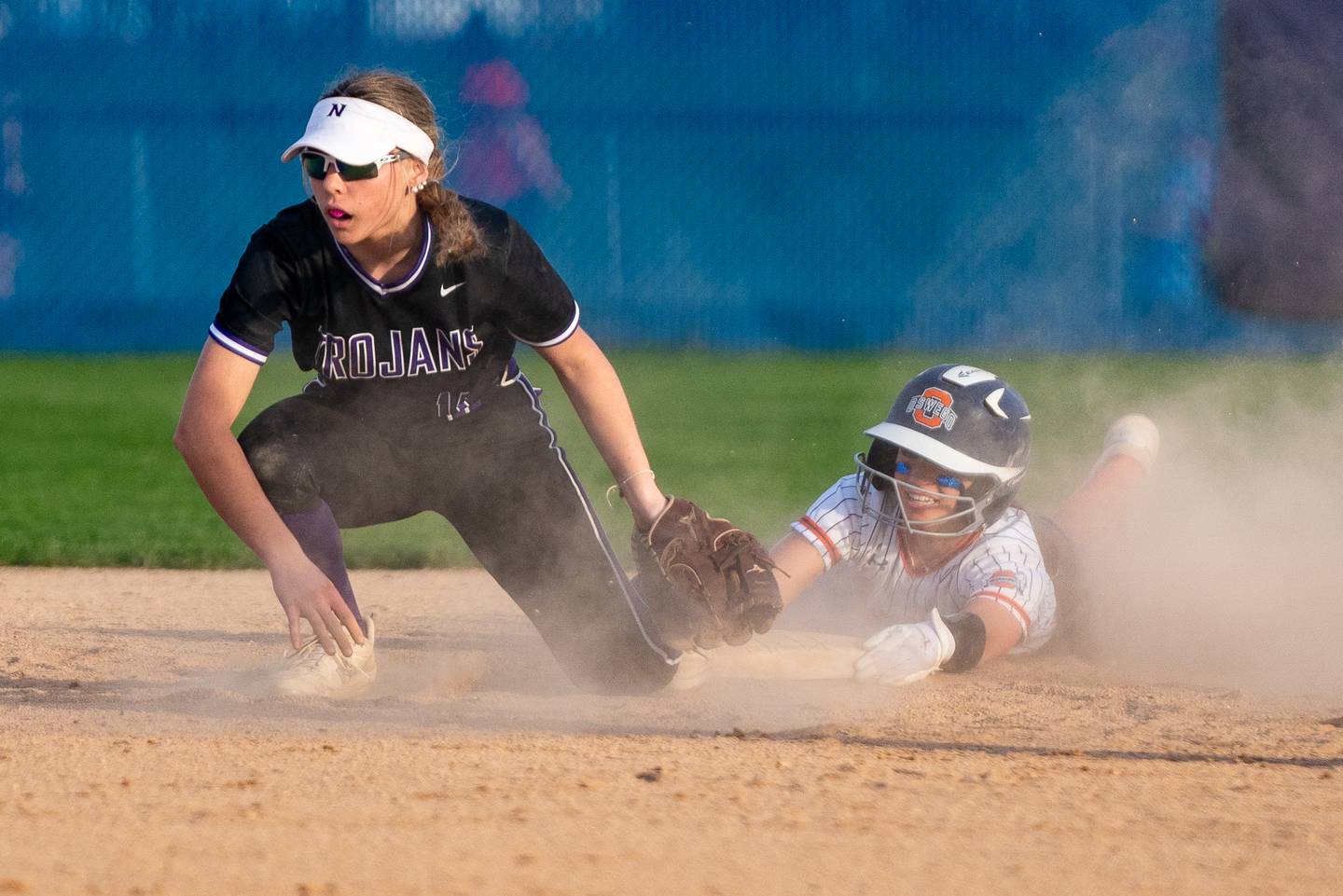 Oswego’s Marissa Moffett (5) steals second against Downers Grove North's Samantha Lehnherr (11) during a softball game at Oswego High School on Friday, April 14, 2023.