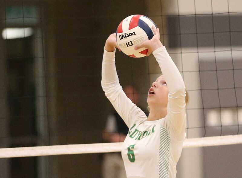 Seneca's Graysen Provance sets the ball in the air whkle playing Marquette on Thursday, Sept. 19, 2024 at Seneca High School.