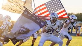Photos: Dixon takes the gridiron against Byron in Week 2 action