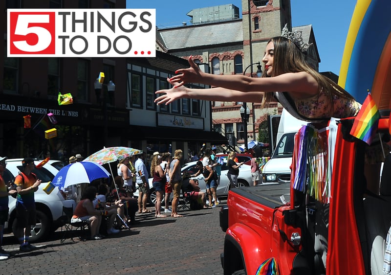 2019 Miss Woodstock Areli Ortiz tosses candy Sunday, June 13, 2021, during the Woodstock Pridefest parade around the historic Woodstock Square.