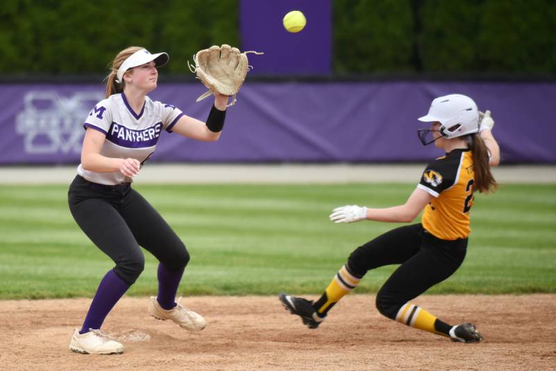 Manteno's Aubrie Goudreau, left, fields a throw at second as Herscher's Reese Hartman slides in with a stolen base during a game at Manteno Tuesday, May 12, 2026.