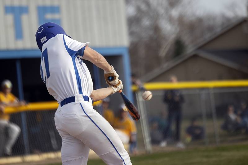 Newman’s Brendan Tunink connects for a three-run homer against Sterling Tuesday, March 12, 2024.