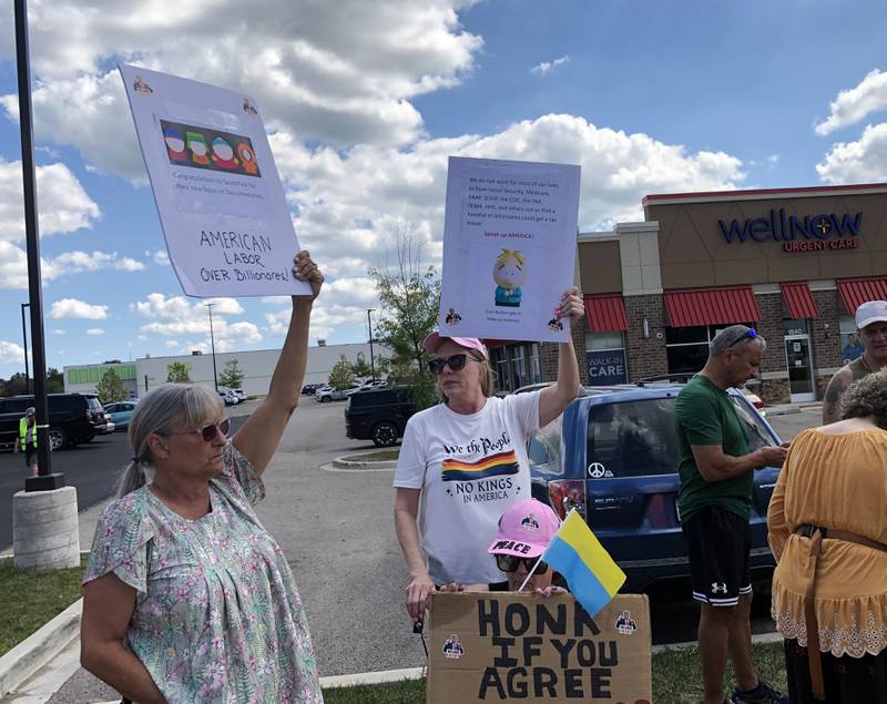 More than 600 people lined Richmond Road on McHenry's north side on Monday, Sept. 1, 2025, as part of the Workers Over Billionaires protest, promoted by Indivisible McHenry County.