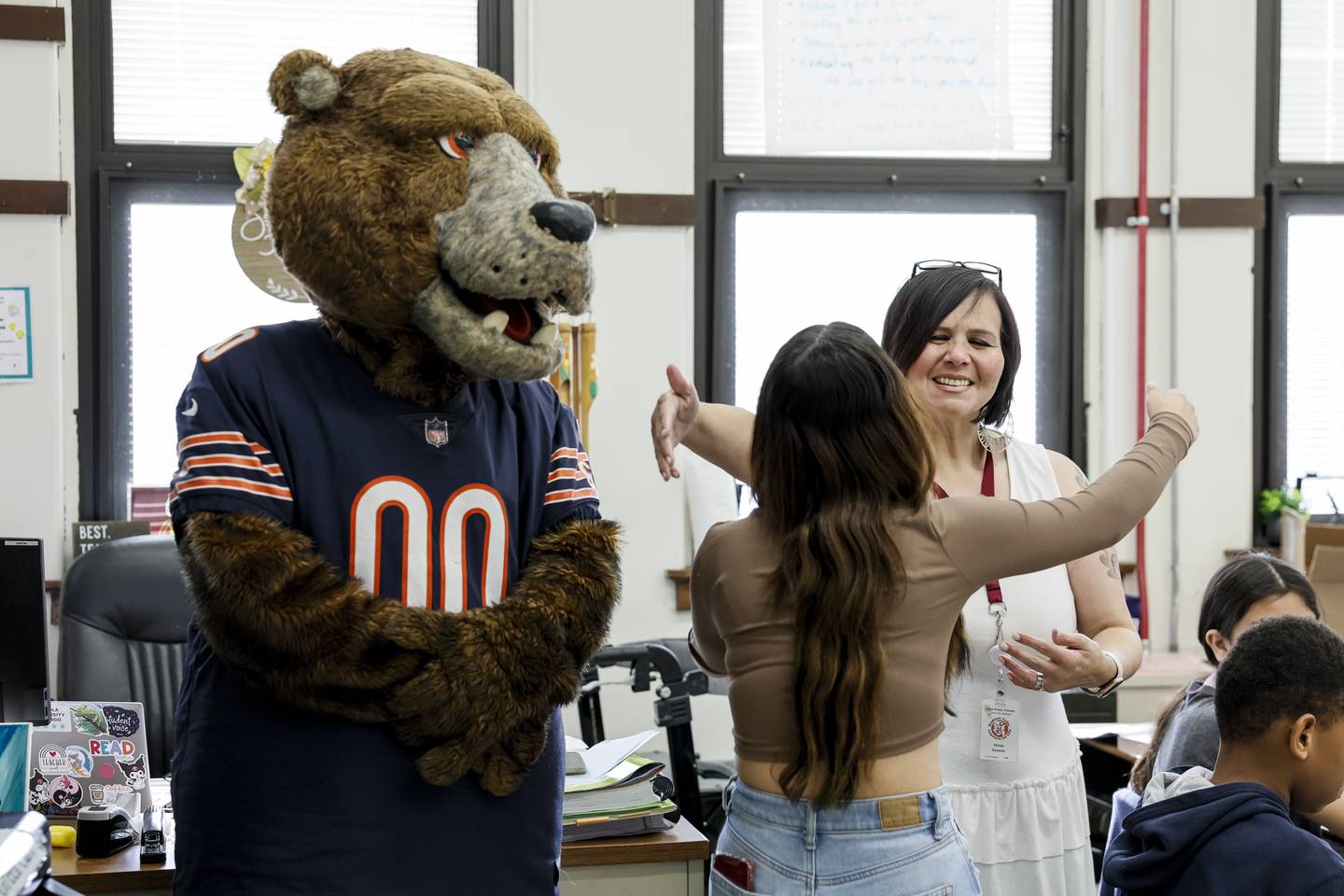 A.O. Marshall School teacher Maida Sauseda hugs former student Crystal Gozalez who nominated her for the Classroom Legends Award.