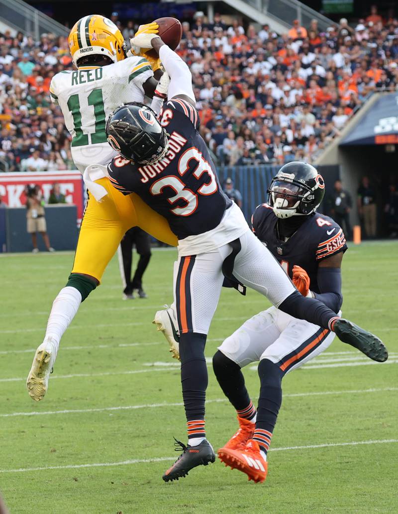 Chicago Bears cornerback Jaylon Johnson breaks up a pass intended for Green Bay Packers wide receiver Jayden Reed during their game Sunday, Sept. 10, 2023, at Soldier Field in Chicago.