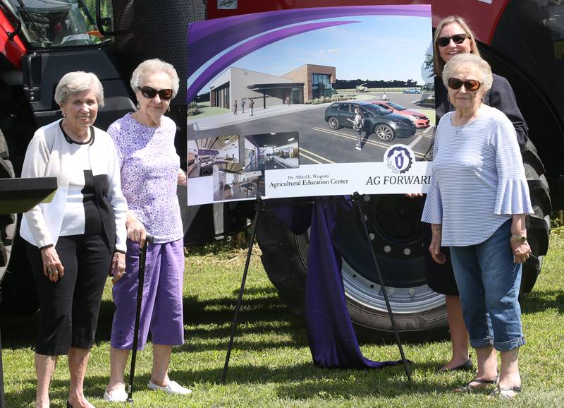 (From left) Joyce Muraro, Jackie Foster and Joan Zellmer pose with Dr. Tracy Morris, President of Illinois Valley Community College, unveil a photo of the new Dr. Alfred E. Wisgoski Agricultural Education on Friday, Aug. 22, 2025 at Illinois Valley Community College in Oglesby. The new building, received a one-million dollar donation from the Wisgoski family, funds from the federal Economic Development Administration and the state of Illinois Department of Commerce and Economic Opportunity, will not only provide physical spaces that reflect the program’s growth, innovation, and capabilities, but the IVCC Agricultural Education Center will also serve as a focal point for agricultural industry activities within the community. The building will take one-year to complete.