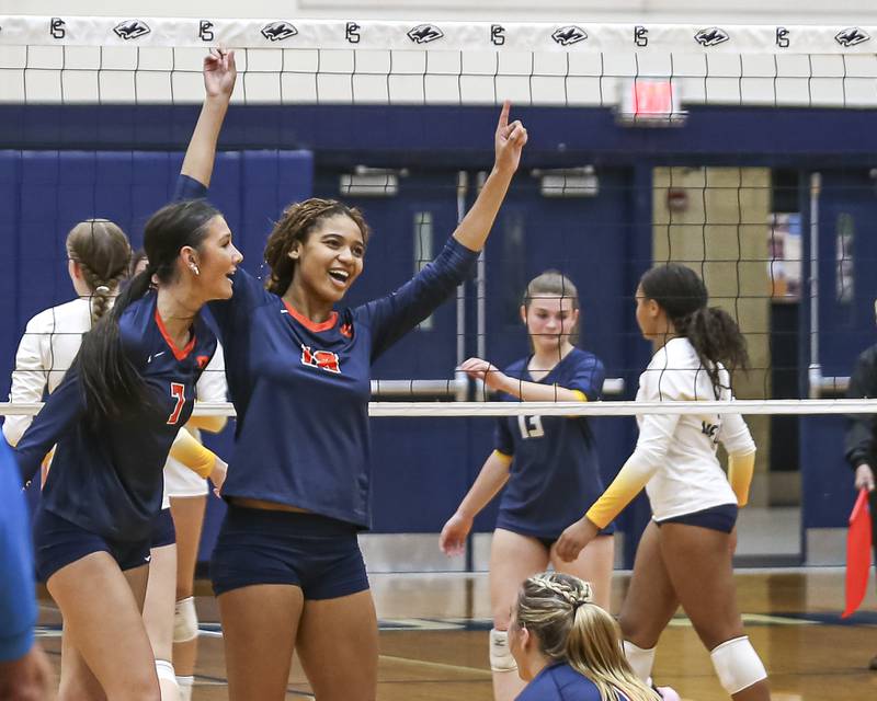 Oswego celebrates their win over Neuqua Valley in their Class 4A Regional Final volleyball match. Oct 30, 2025 in Plainfield.