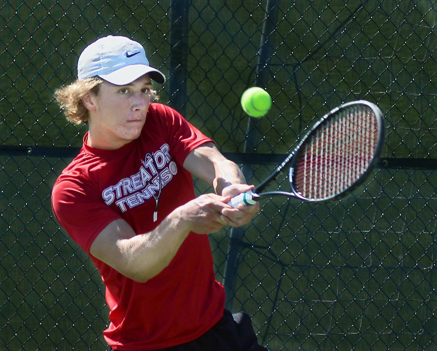 Streator singles standout Davey Rashid hits a backhand against Metamora's Alexander Schroff during the 2021 Ottawa Class 1A Sectional finals at Ottawa's King Field courts.