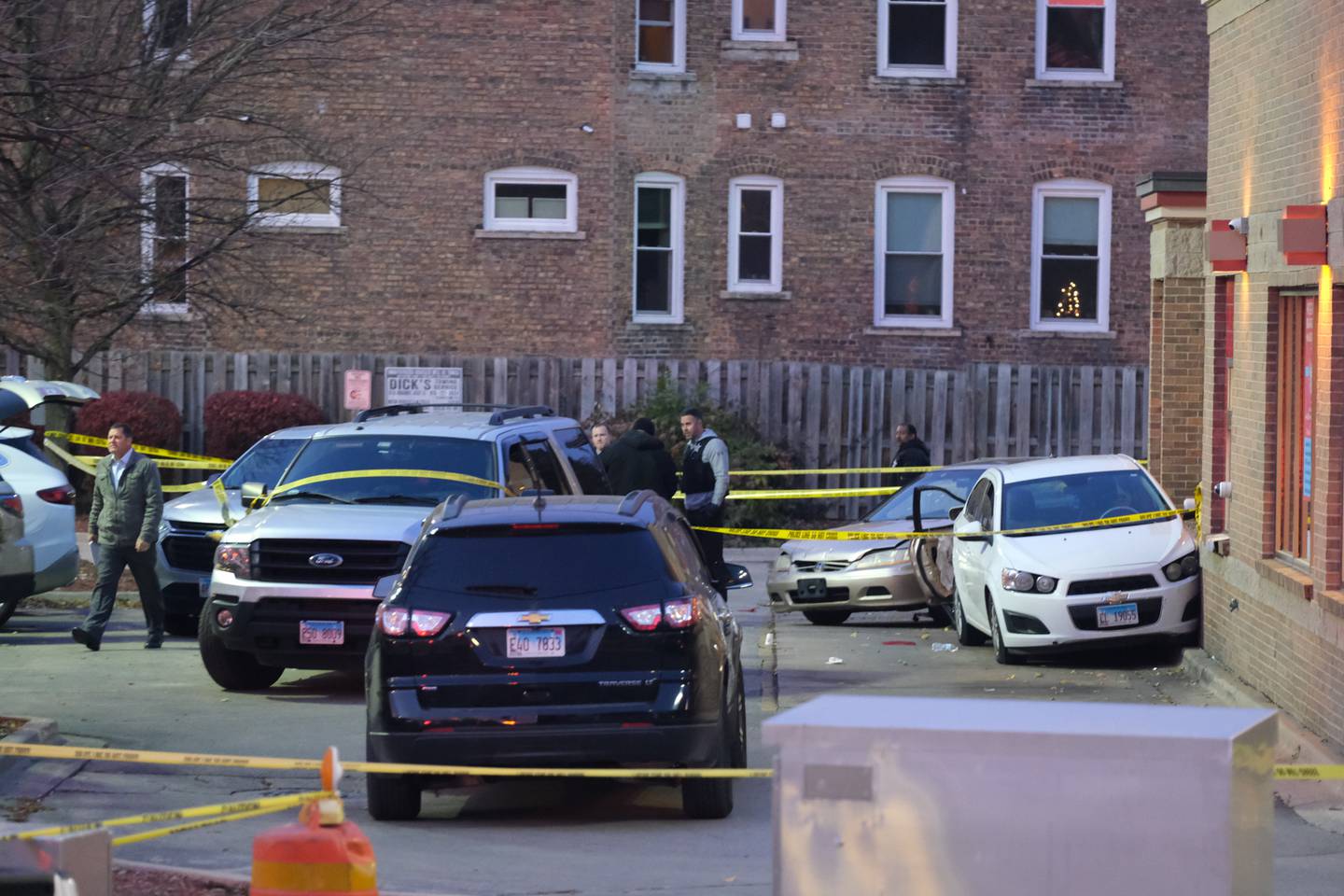 Police work the crime scene of a shooting outside Wendy's at West Jefferson and North Center streets Tuesday, Nov.16, 2021 in Joliet.