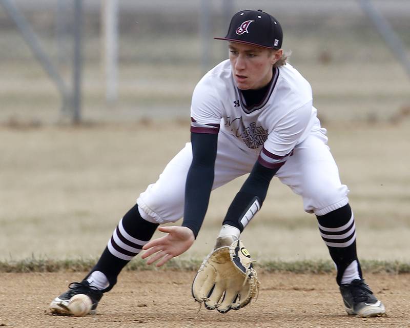 Marengo's Quinn Lechner tries to field the ball during a non-conference baseball game Wednesday, March 30, 2022, between Marengo and Hampshire at Marengo High School.