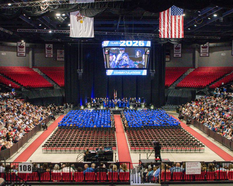 Seniors who are members of the St. Charles North choir sing during the graduation ceremony held Monday, May 18, 2026, at the NIU Convocation Center in DeKalb.