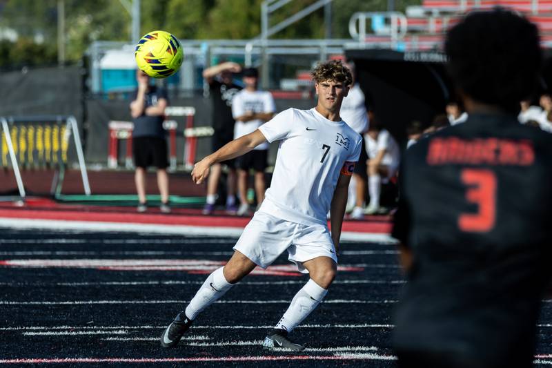 Minooka's Ethan Koranda passes the ball during a varsity soccer away game against Bolingbrook on Sept. 16, 2025.