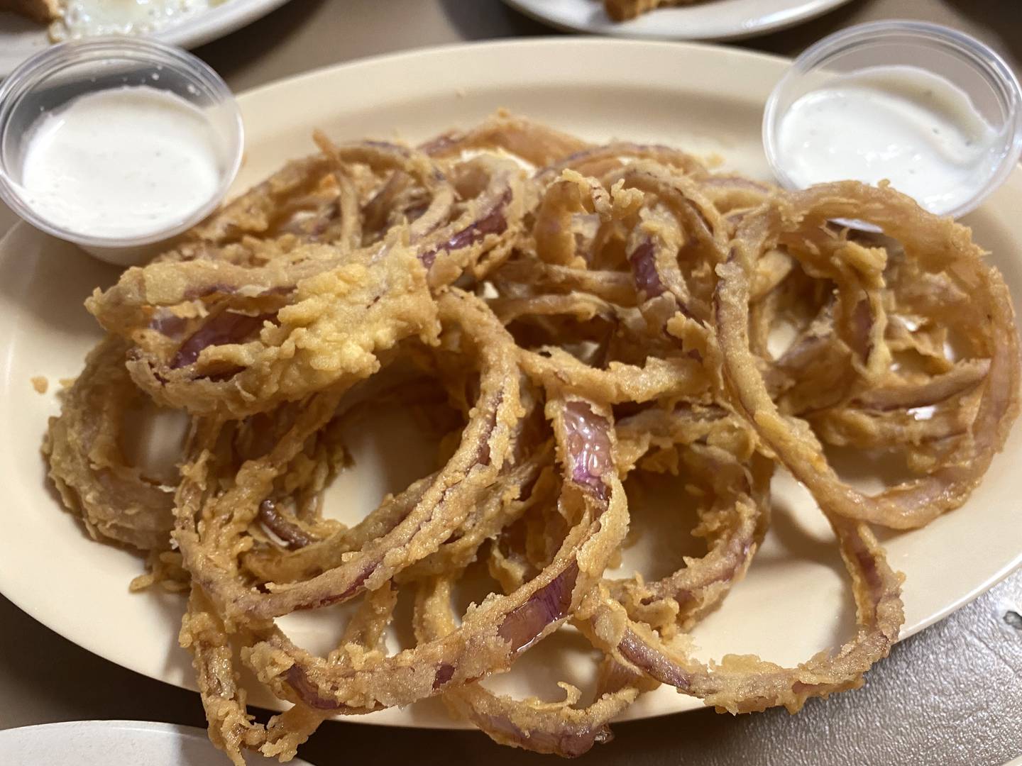 Victoria's Country Diner's made-in-house onion rings cost a little more than the regular onion rings, but light on the breading and strong on the sweet onion flavor, they are most definitely worth it.