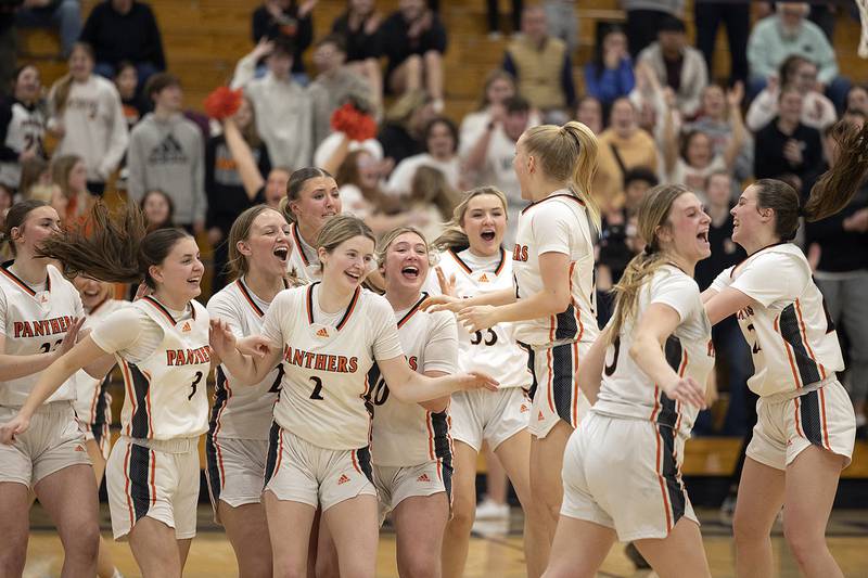 Washington celebrates their win over Sterling Monday, March 3, 2025, at the 3A Supersectional at Rochelle High School.