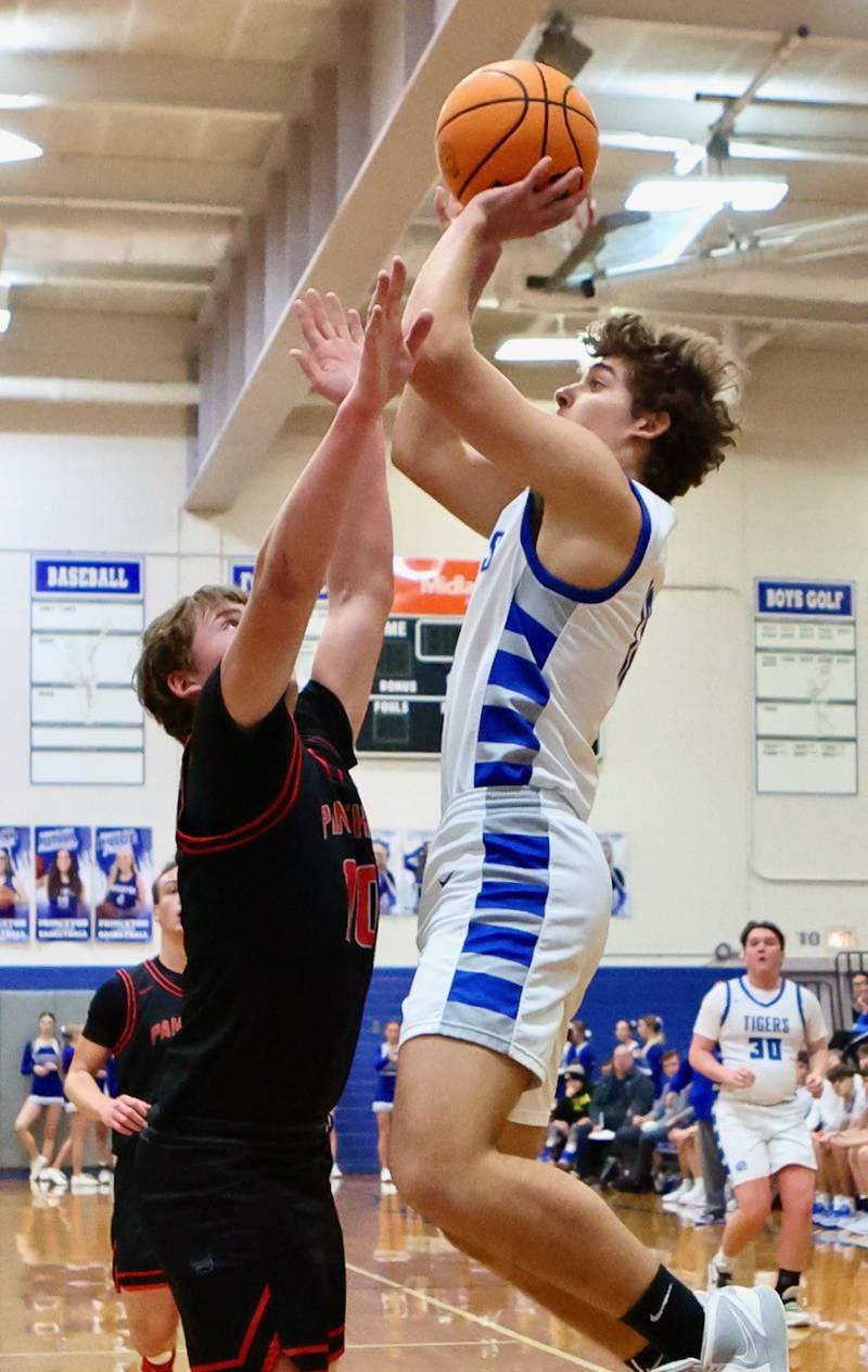 Princeton senior Asa Gartin soars for a shot in Friday's game vs. Erie-Prophetstown at Prouty Gym.