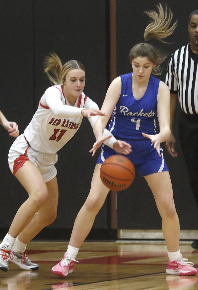 Huntley's Anna Campanelli tries to grab a loose ball in front of Burlington Central's Emersyn Fry during a Fox Valley Conference girls basketball game Friday, Feb.2, 2024, at Huntley High School.