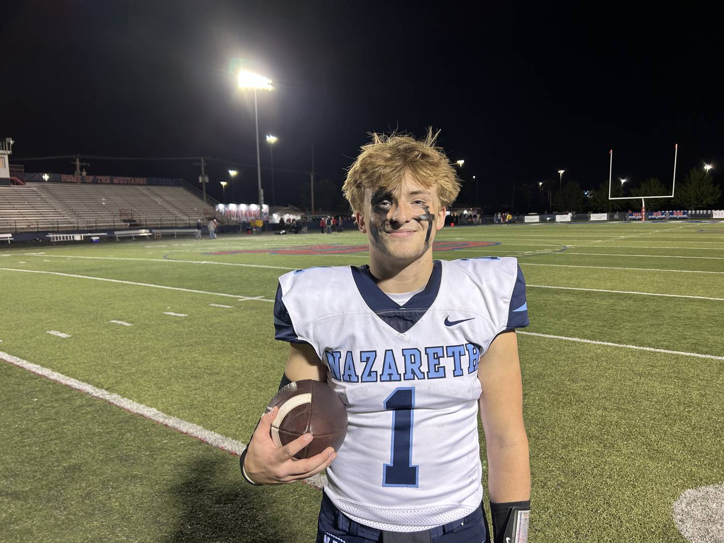 Nazareth senior quarterback Logan Malachuk helped lead the Roadrunners to a 45-21 win over St. Rita in Chicago on Friday.