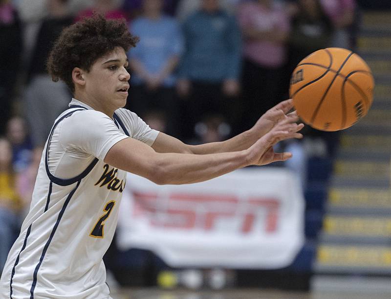 Sterling’s Deandre Maas makes a pass against Quincy Friday, Jan. 30, 2026.