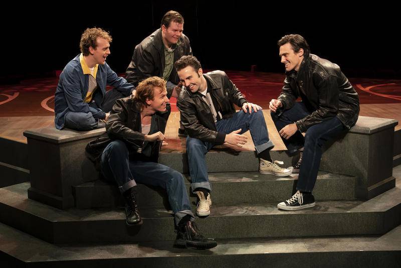 Cast members act out a scene in a production of "Grease" in this undated photo.