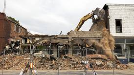 Demolition begins on fire-ravaged downtown Sterling apartment building