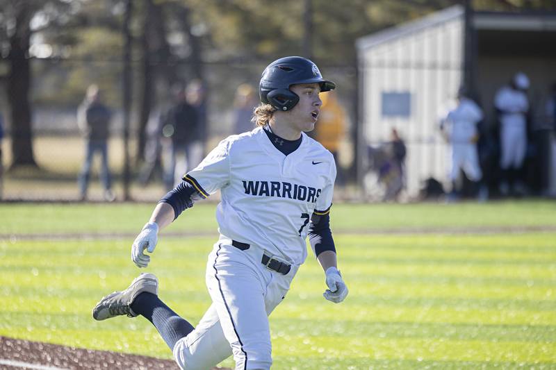 Sterling’s Miles Nawrocki heads to first after driving the ball into right center for a single Monday, March 27, 2023 versus Lasalle-Peru.
