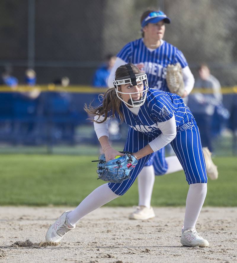 Newman’s Brenleigh Cook scoops and throws to first for an out against Hall Monday, April, 21, 2025.