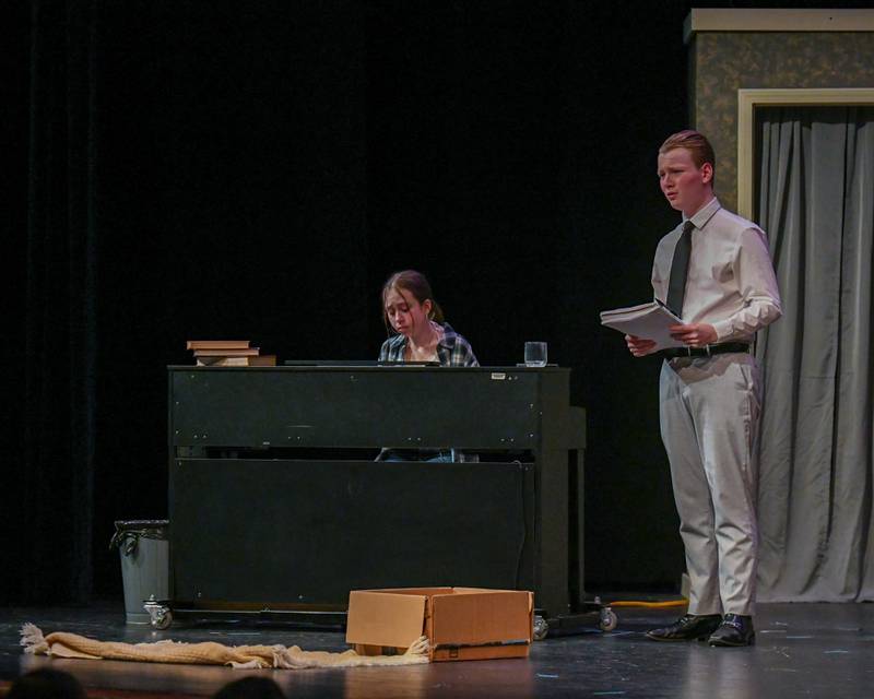 Thomas Kings, right, and Delilah Pawlowski try to write a song during a one act play called Bittersweet Lullaby on Saturday March 22, 2025, held at Lyons Township High School south campus.