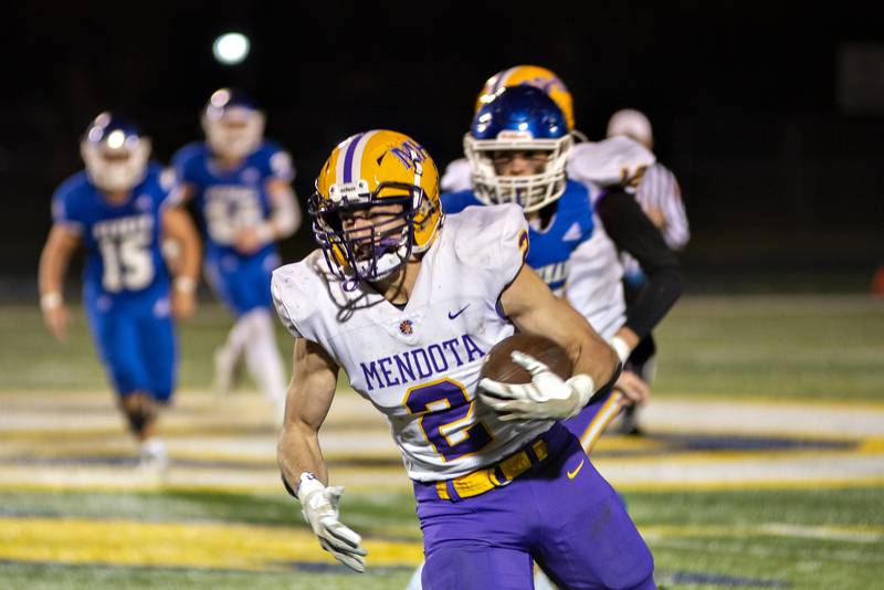 Mendota's #2 runs it in for a touchdown after a hook and ladder play against Newman.