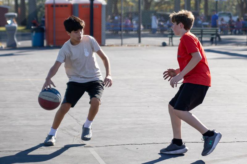 Children play basketball at the annual Harvest Fest on Saturday, Oct. 19, 2024, at Kirby Park in Spring Valley.