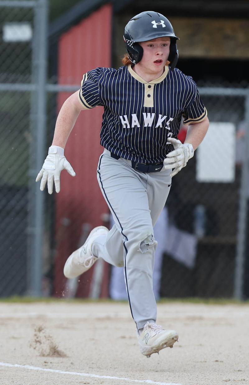 Hiawatha's Tommy Butler runs to first during their game against Indian Creek Thursday, April 20, 2023, at Indian Creek High School in Shabbona. The game was stopped in the first inning due to weather.