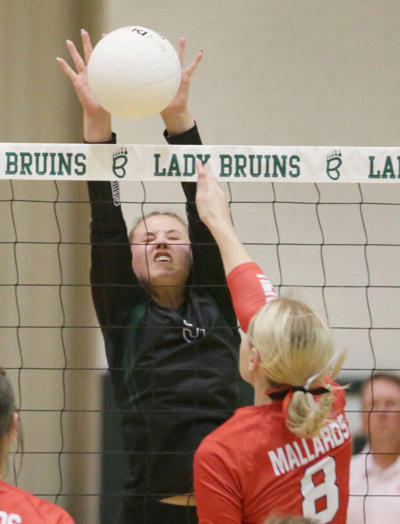 St. Bede's Emily Robbins (5) blocks a spike from Henry's Talur Homann (8) in the Class 1A semifinal game on Wednesday, Oct. 16, 2022 at St. Bede Academy in Peru.