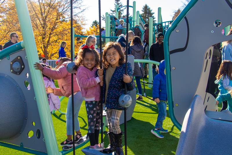 Growing Tree preschoolers enjoy their new playground.