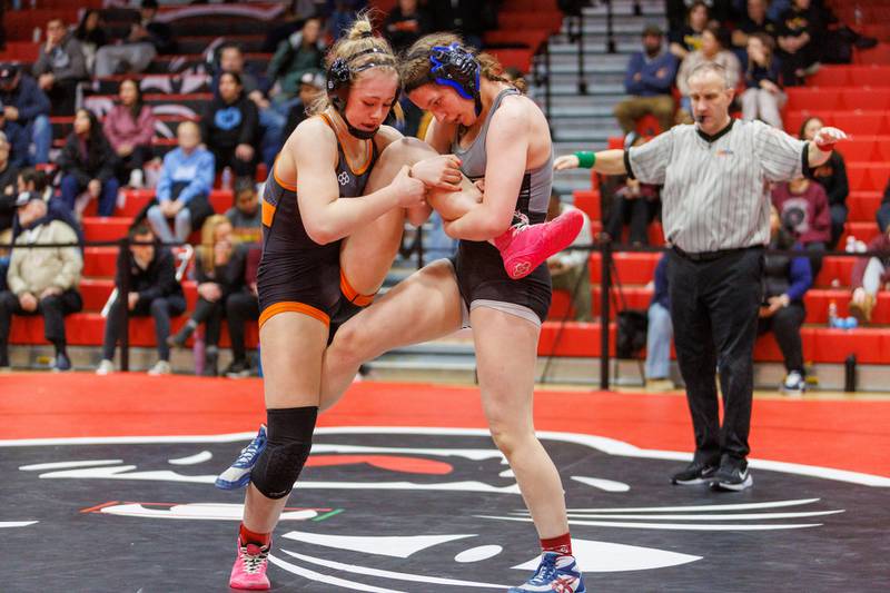 Wheaton Warrenville's Louisa Enslen and Lincoln Way South's Ella Giertuga compete in the championship 145 lb class at the East Aurora Wrestling Regional on Saturday, Feb.7,2026 in Aurora.