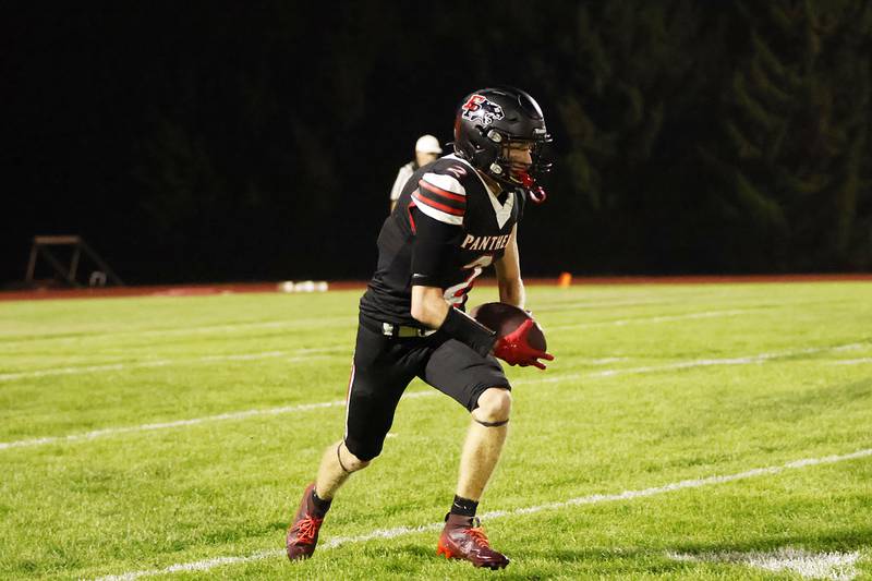 Erie-Prophetstown senior Connor Keegan charged upfield Friday night in  Erie for the Panthers homecoming game against the visiting Riverdale Rams. The Panthers took home the victory 42-36.
