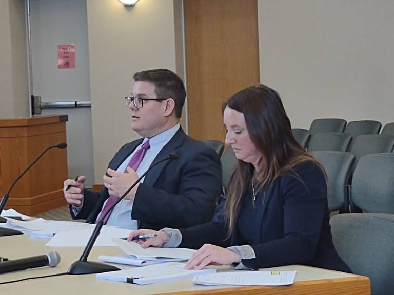 Attorneys John Dickson, left, and Brandy Quance, right, represent John Kountz and Brett Hopkins, respectively, during a hearing on Wednesday, Jan. 25, 2023, regarding Hopkins' candidate papers for the April election for Crystal Lake City Council. Hopkins' candidacy was deemed valid by the Crystal Lake Municipal Officers Electoral Board.