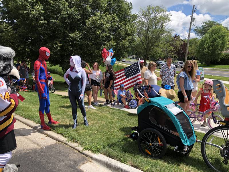 As it was Character Day at Crystal Lake's Lakeside Festival, characters including Skates the Gray Wolf of the Chicago Wolves hockey team, Spider-Man and Spider-Woman lead the parade two blocks from Main Beach to the festival grounds on Saturday, July 6, 2024.