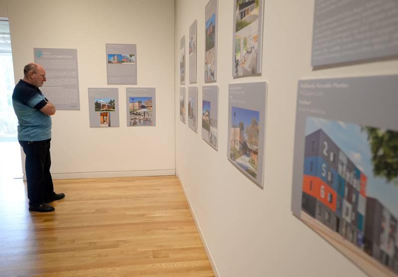 Kim Keller of Aurora looks through the Houses of Tomorrow exhibit at the Elmhurst Art Museum during Museum Day held Sunday May 15, 2022.