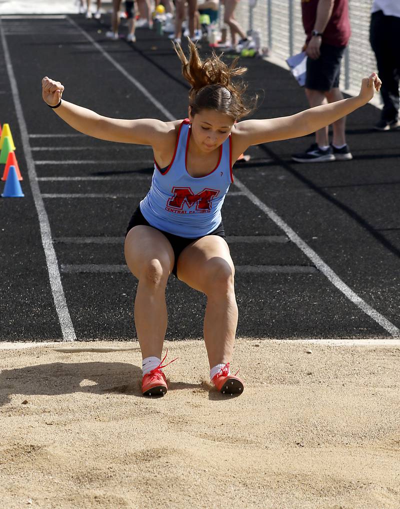 Marian Central’s Addie Leitzen competes in the triple jump on Thursday, April 23, 2026, during the McHenry County Track and Field Meet at McCracken Field in McHenry.