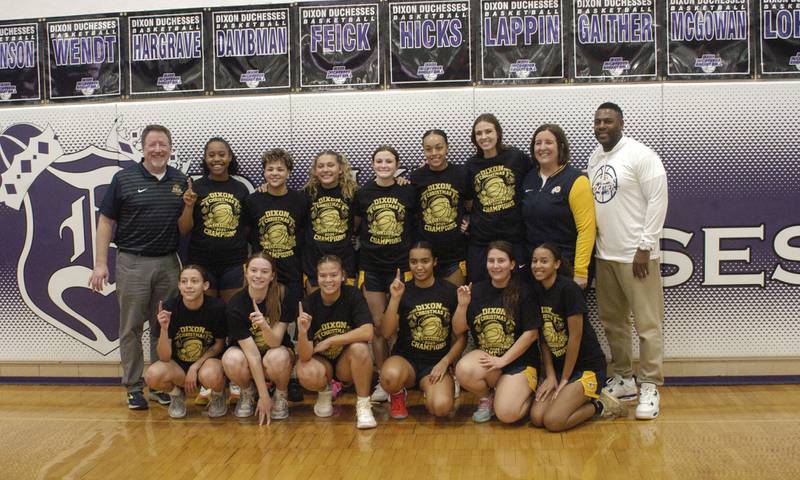 The Sterling Girls Basketball team poses with their tourney shirts . The Sterling Golden Warriors played  the Byron Tigers in the championship game of the Dixon Holiday Tournament at Dixon High School on Monday, December 29th, 2025.