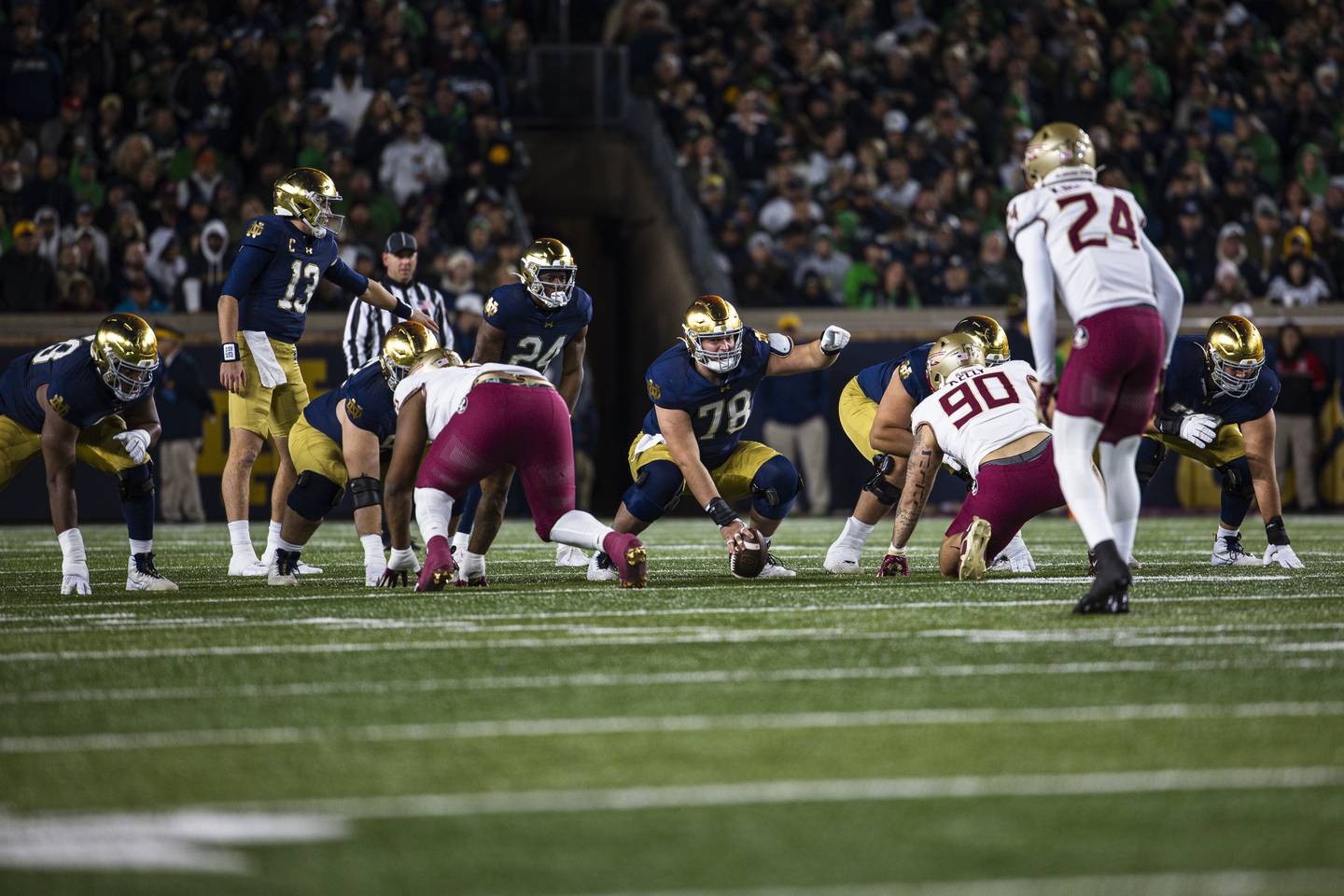 Marist alumnus and Notre Dame offensive lineman Pat Coogan (78) points something out before a snap against Florida State earlier this season. Photo courtesy Notre Dame Athletics