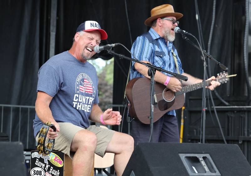 The band Burn N’ Bush entertains visitors Friday, Aug. 25, 2023, during Corn Fest in downtown DeKalb.