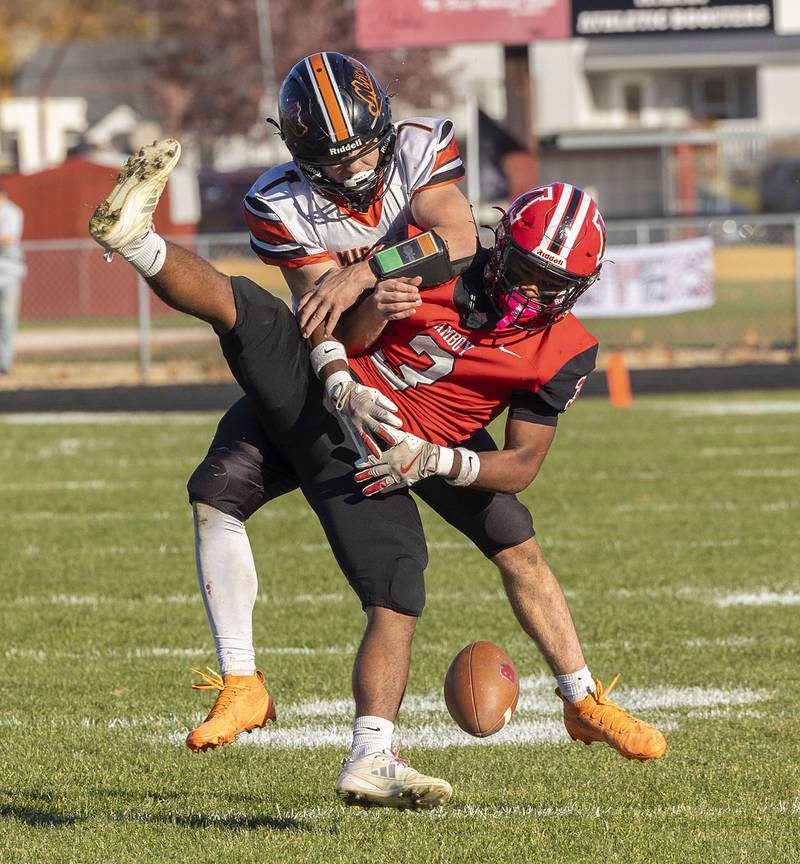 Amboy’s Cody Winn is unable to pull in a pass while being defended by Milledgeville’s Konner Johnson Saturday, Nov. 15, 2025, in the 8-man football semifinal.