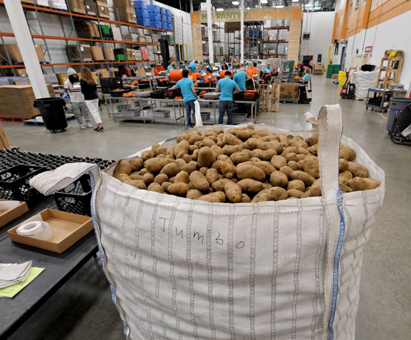 A “jumbo” sack of potatoes waits to be sorted and bagged at the Northern Illinois Food Bank in Geneva on Thursday, July 10, 2025.
