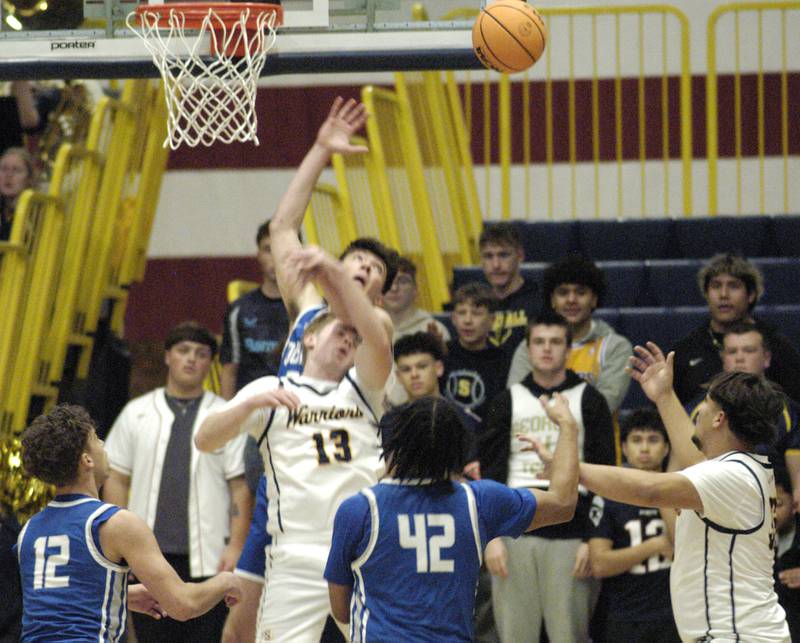 Sterling's Will Ports  gets hammered under the basket. The action took place on Friday, December 13th at Sterling.