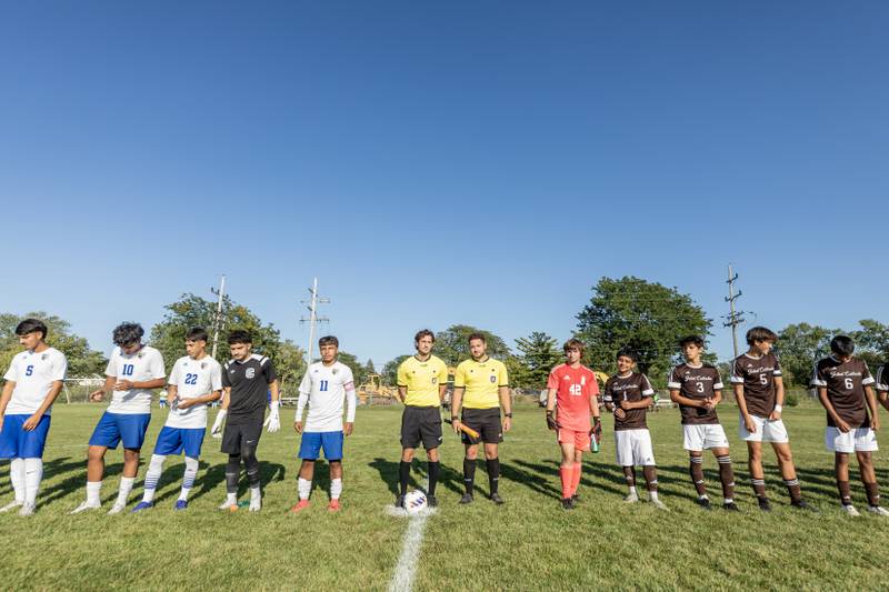 Joliet Central and Joliet Catholic line-up for introductions at the start of a varsity soccer home game at Joliet Catholic on Sept. 8, 2025.