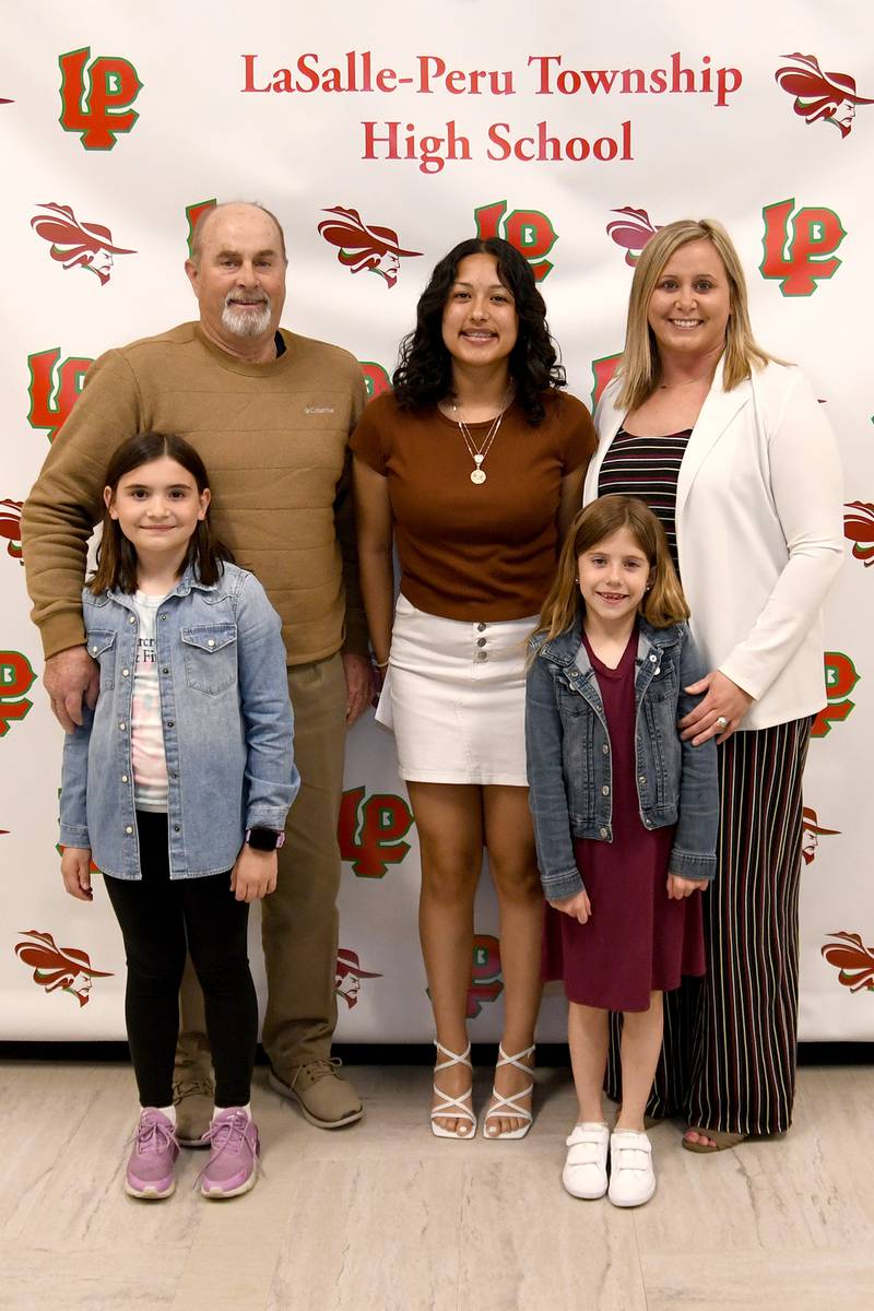 Coral Garcia (middle) received the Deb Pyszka Memorial Scholarship, presented by the Pyszka family: Mike, Megan, Vivi and Holly. This scholarship was established to honor Deb Pyszka, who was an IVCH nurse for 39 years. Throughout her career, she consistently carried a passion and love of nursing. The scholarship is awarded to a graduating senior with a 3.5 GPA or higher and be pursuing a registered nursing degree.