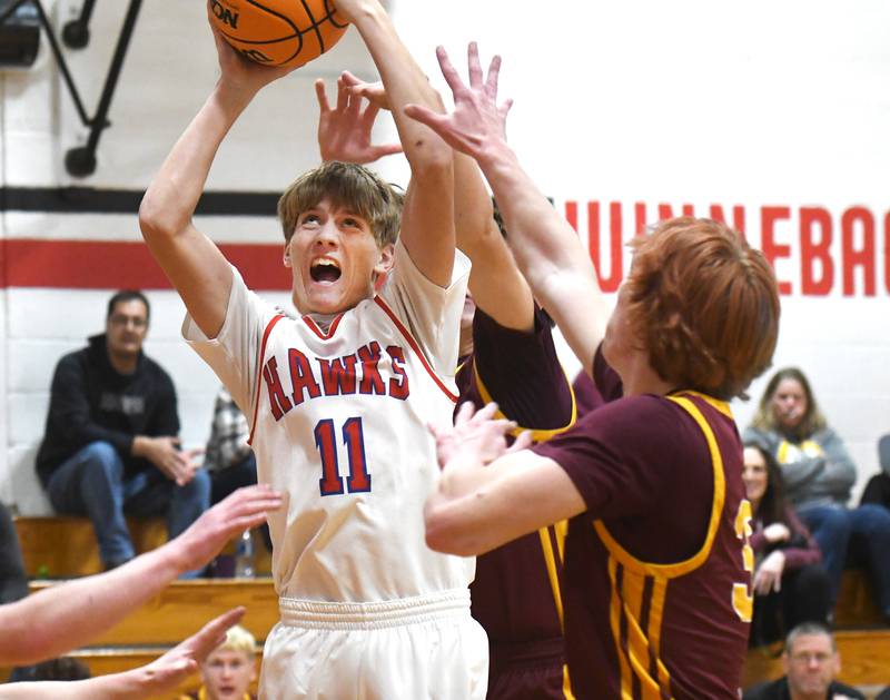 Oregon's Deryk Withers (11) shoots against Stockton on Saturday, Dec. 13 at the 64th Annual Forreston Holiday Basketball Tournament held at Forreston High School.